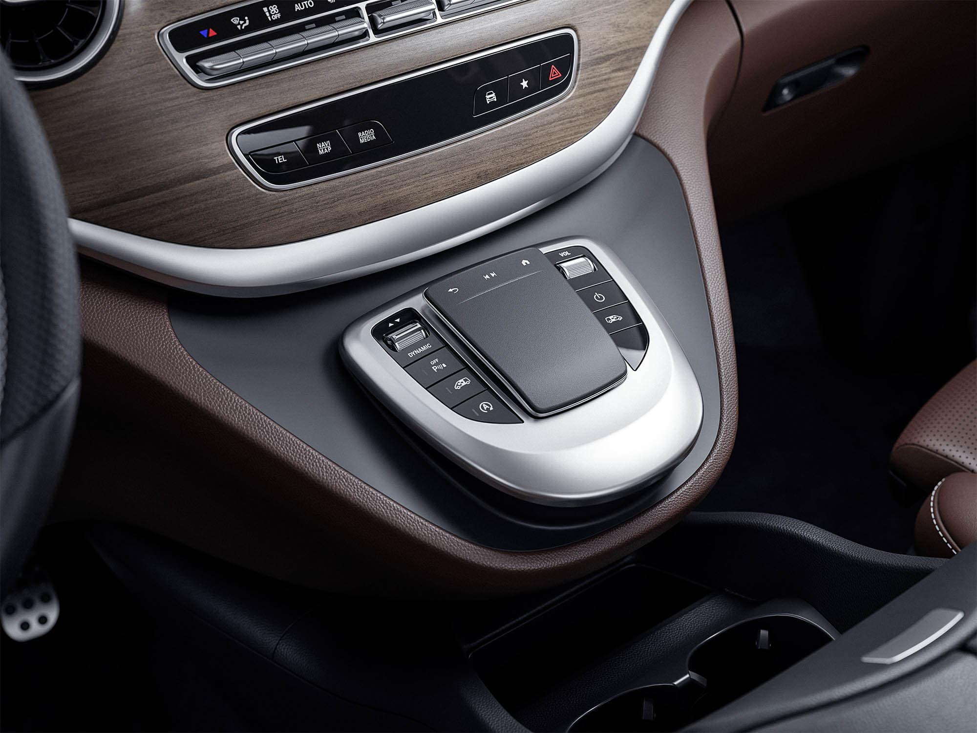 Close-up of the V-Class centre console with touchpad and wood trim