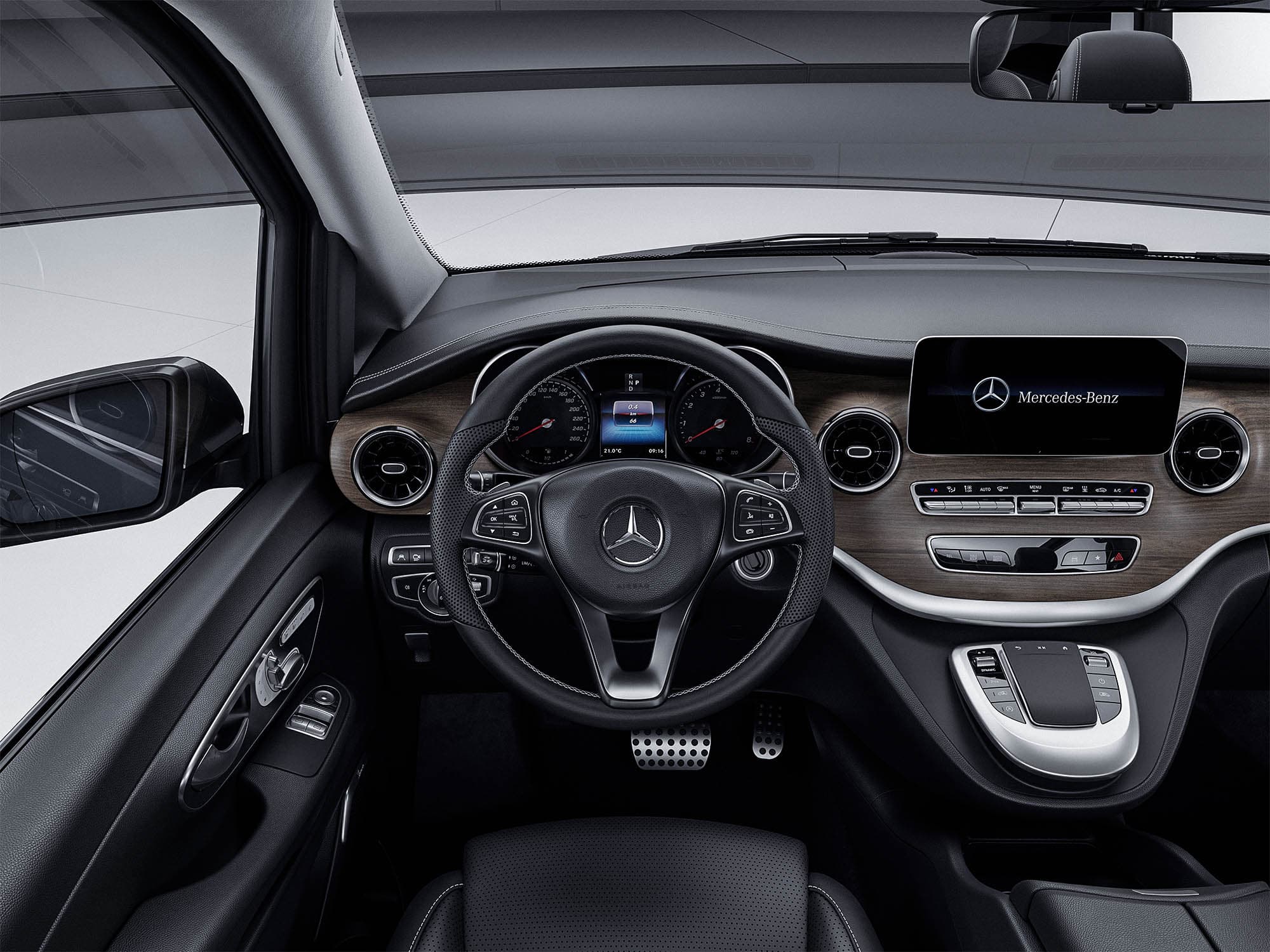 Driver's view of the V-Class cockpit with wood trim and central display