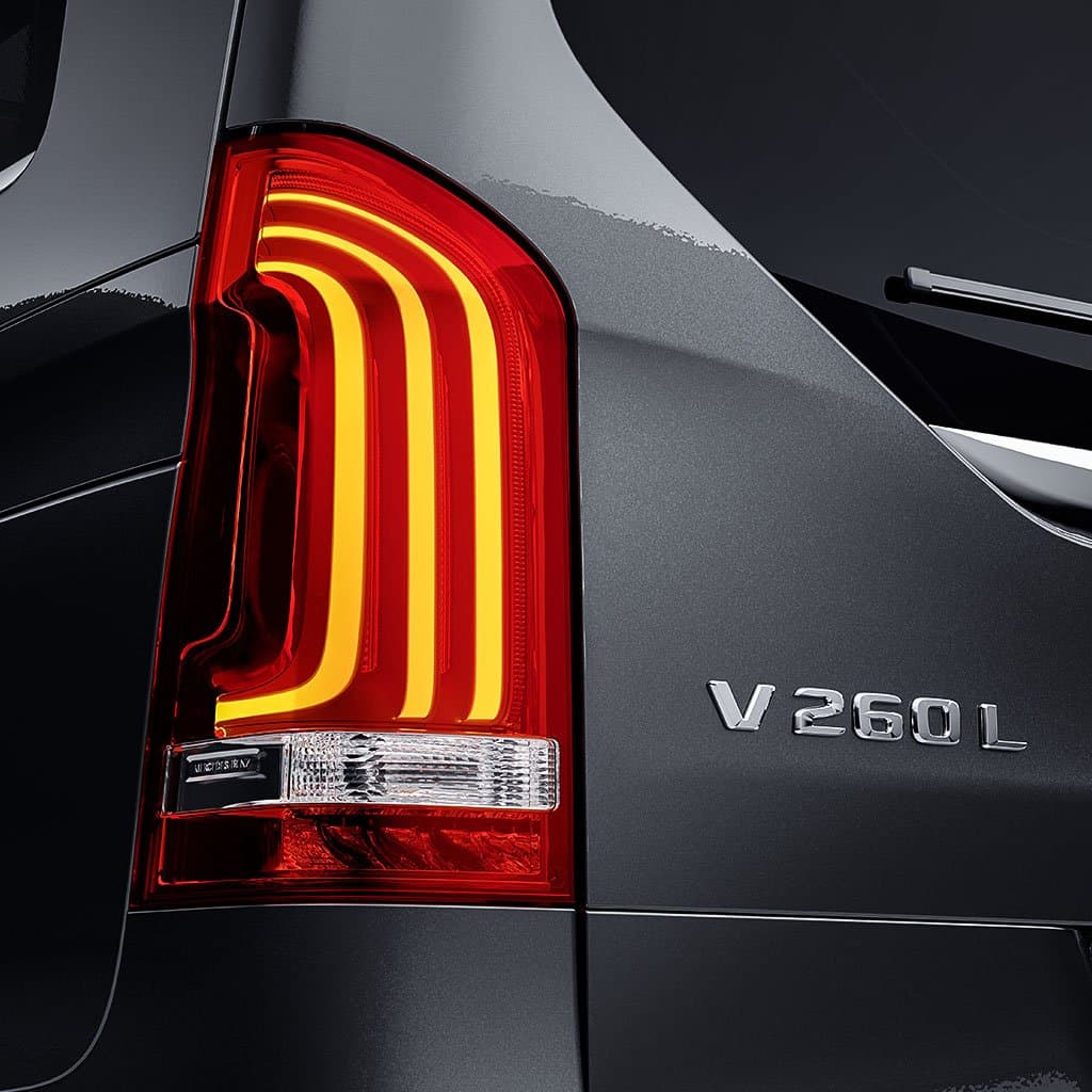 Close-up of the illuminated V-Class tail light and V 260 L badge