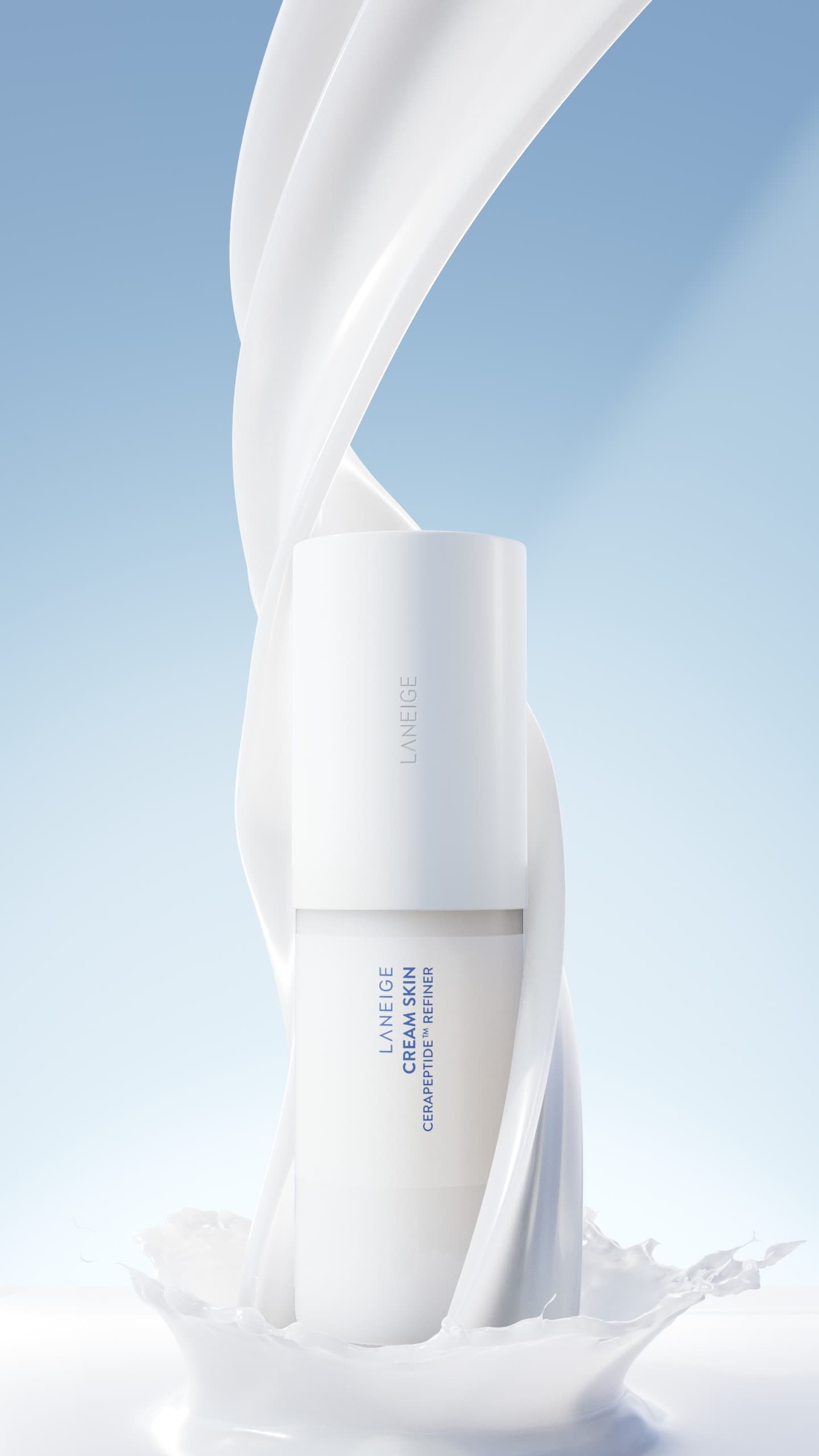 Laneige Cream Skin refiner standing in a splash of milk under a blue sky